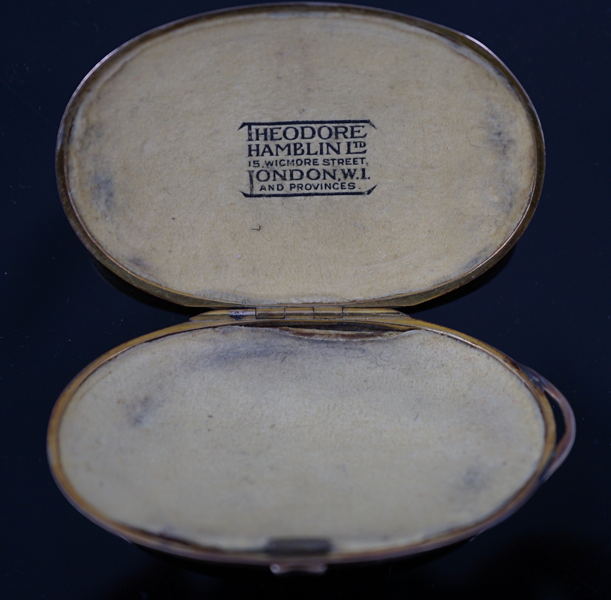 A pair of engraved gold mounted spectacles